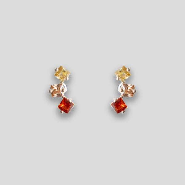 Coo Coo: Coo Coo: Triple Diamante Arc Studs - Yellow/Peach/Garnet